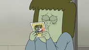 S8E03.060 Muscle Man Kissing His Photo