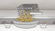 S8E09.214 Fries Poured into a Bowl