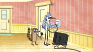 S4E20.063 Rigby Timing Mordecai on the Phone