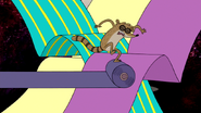 S5E09.032 Rigby Rolling on a Fabric Roll