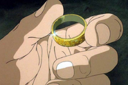 Bilbo holding the One Ring