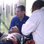 The nurse taking Vic Mackey into surgery.