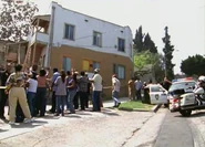 Mob-tanya-violet.jpg (32 KB) Mob in front of Tanya Kramer's house.