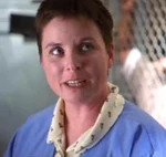 The medical examiner talks with  about 's severed arm.