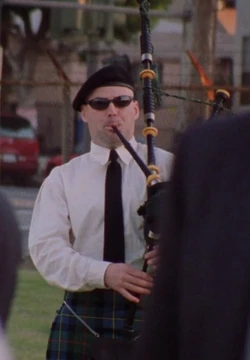 4x02 Bagpipe performer