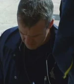 The paramedic treats the attacked .