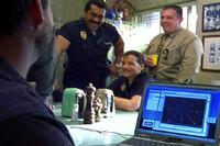 3x12 Hispanic Mark Stone and officer laughing