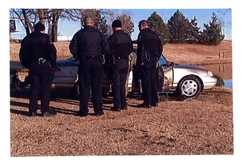 Police Examining Mary's car.