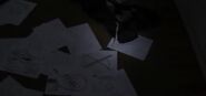 (1:49) Chris' room, littered with notes containing the Operator Symbol and drawings of Slender Man. A prime example of The Obsession.