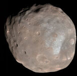 The larger of the two moons, Phobos.