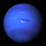 Neptune's Great Dark Spot and its companion bright smudge; on the west limb the fast moving bright feature called Scooter and the little dark spot are visible.