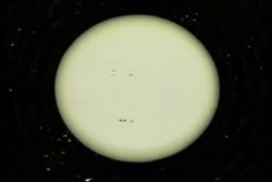 An artist impression of Sol and a starry background. Copyright © 1991 Don Barrett