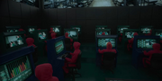 Managers on the control room monitoring players