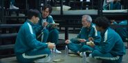 Seong Gi-hun's team bonding before the second game.
