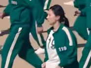 Player 119 running in a green light.