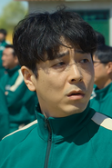 Oh Yeong-uk complaining Seong Gi-hun about the Game.