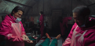 Guards harvesting organs from a dead player.