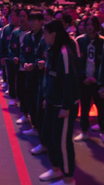 Player 448 watching as Park Mi-hwa goes to vote.