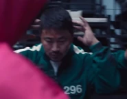 Player 296 and Player 096 with their hands up after the Special Game