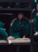 Player 435 in the dormitory after Red Light, Green Light game.