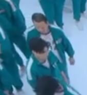 Player 032, seen with Jang Deok-su's gang for the first time