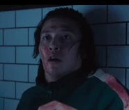 Player388SquidGame.jpg (81 KB) Dae-ho flinching when Hyun-ju asks him where the ammo is.