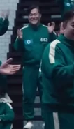 Player 443 cheering after Team O wins the vote.