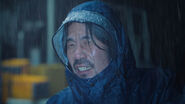 Captain Park sees Choi Woo-seok after he kills the Drone Pilot.