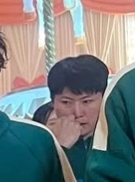 Player 344 during the filming of a round of Mingle (likely Round 4 due to the positioning of Players 328 and 249), as seen in a BTS photo.