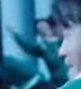 Player 134 as Player 116 is about to hit him with a glass bottle