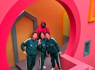 Player 119 posing with Players 116 and 310 in BTS.