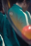 Player 443 holding his red gumball.