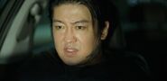 Deok-su moments before killing his subordinate