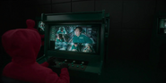 Another Player 417 being monitored in the Squid Game control room