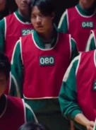 Player 080 standing with the seekers.