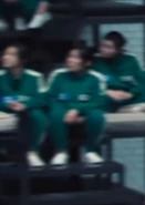 Player 028 listening to the announcements listing the people who died in bathroom fight.