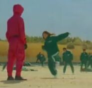 Low quality image of Player 056 crossing the finish line (error)