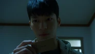 Hwang Jun-ho found a strange card in his brother room