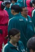 Player 023 is waiting in line to sign a contract