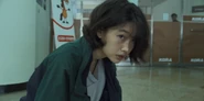 Sae-byeok EP1.png (1.04 MB) Sae-byeok after pickpocketing Seong Gi-hun.