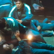 Another Player 326 attacking and stopping Player 081 from strangling an unknown player