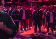 Player 448 standing with the rest of the players who voted to discontinue the games.