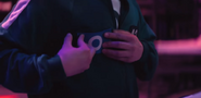 Player 435 putting the O patch on his uniform.