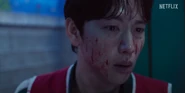 Myung gi face blood.png (654 KB) Myung-gi after killing Cho Hyun-ju, seeing Kim Jun-hee holding her baby.