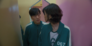 Sang-woo questioning Sae-byeok