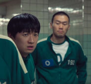Player 192 looks at Min-su