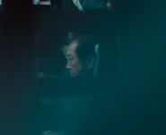 Player 241 listening to Gi-min's plan.