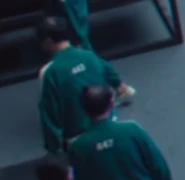 Another Player 443 walking up to his bunk bed.