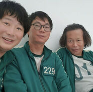 Player 130 with Player 229 and Do Jung-soo in Behind the Scenes