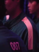 Player 080 watching Geum-ja walk up to vote.